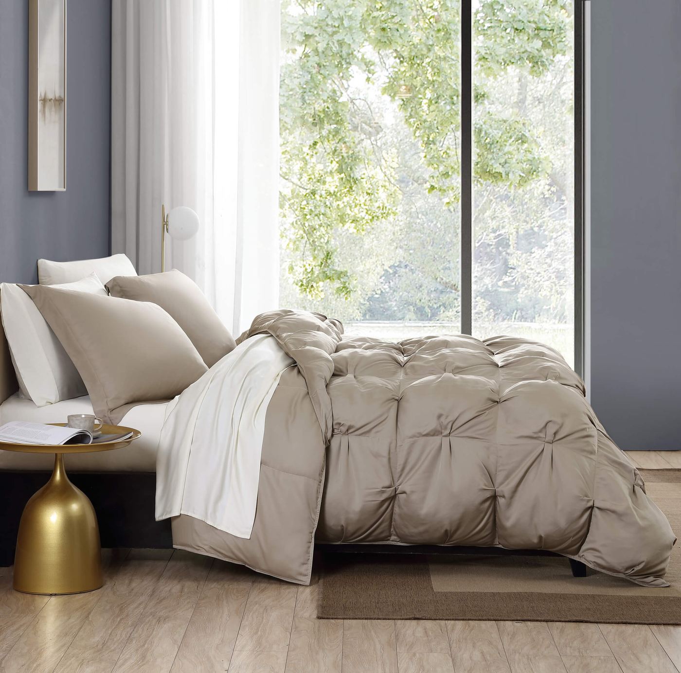 Sunday Citizen comforter in Taupe on a bed